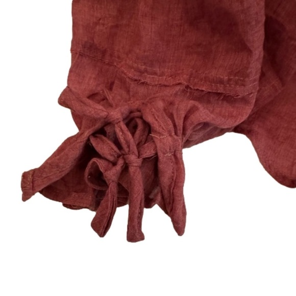 P.S. Love Smocked Cuff Poet Shirt.
NEW. Size Small. Rust/Burgundy Color - Picture 5 of 9